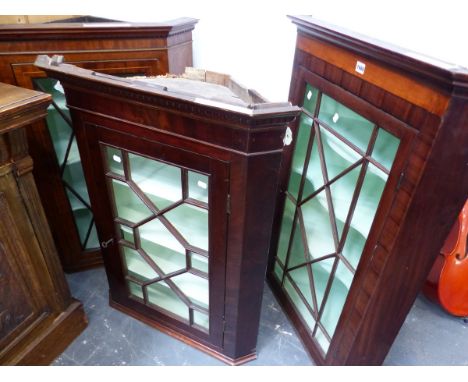 THREE ASTRAGAL GLAZED MAHOGANY CORNER CABINETS, EACH WITH PAINTED SHELF INTERIORS, THE TALLEST.   W 79 x D 48 x H 110cms.