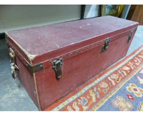 A LOUIS VUITTON RED REXINE SLOPE BACKED CAR TRUNK WITH INTERIOR LIFT OUT TRAY. W 105cms. H. 38cms.&nbsp; D. 34cm