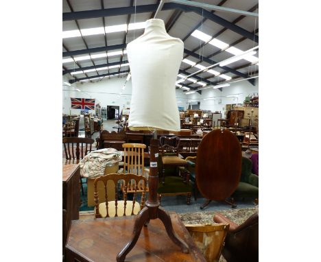 A FAUBORG ST HONORE CHILDS MANNEQUIN ON OAK COLUMN AND TRIPOD