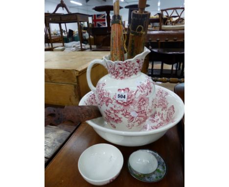 AN ANTIQUE WASH JUG AND BASIN, TWO PARASOLS, AND AN ORIENTAL PAGE TURNER. 