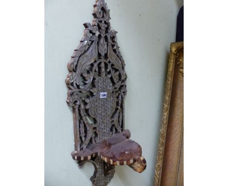 A PAIR OF MOTHER OF PEARL DECORATED WALL HANGING TURBAN STANDS, THE BACKS PIERCED AND CARVED WITH A PAIR OF BIRDS AMONGST FOL