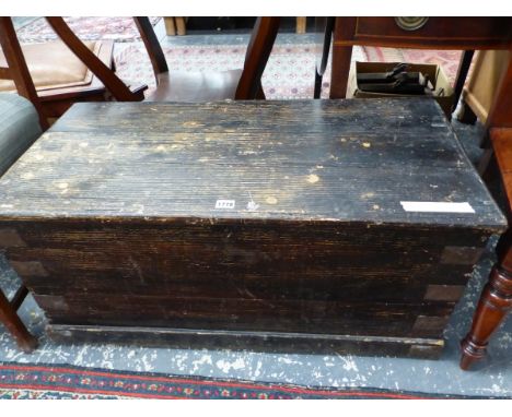 AN VINTAGE EBONISED PINE TWO HANDLED TRUNK. W 92 x D 46 x H 43cms.