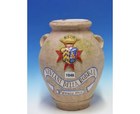 A FLORENTINE OVOID JAR PARTIALLY GLAZED ON ONE SIDE WITH THE ARMORIAL AND NAME OF THE VIVIANI DELLA ROBBIA FAMILY.   H 31cms.