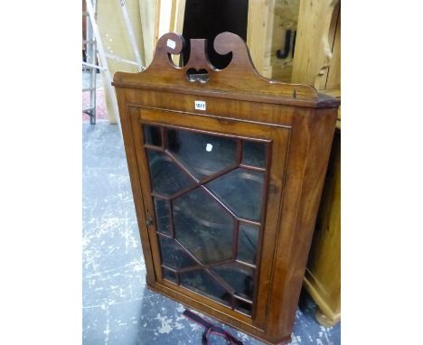 AN ASTRAGAL GLAZED MAHOGANY FOUR SHELF CORNER CUPBOARD