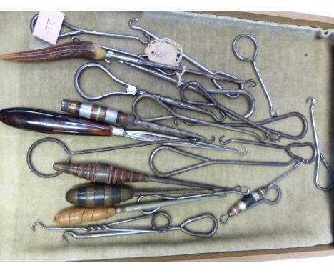 SIXTEEN BUTTON HOOKS WITH LOOPED STEEL HANDLES TOGETHER WITH SEVEN WITH VARIOUS TYPES OF HANDLE