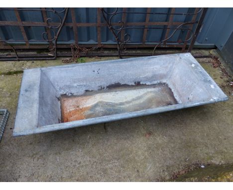 A RECTANGULAR GALVANISED WATER TROUGH.