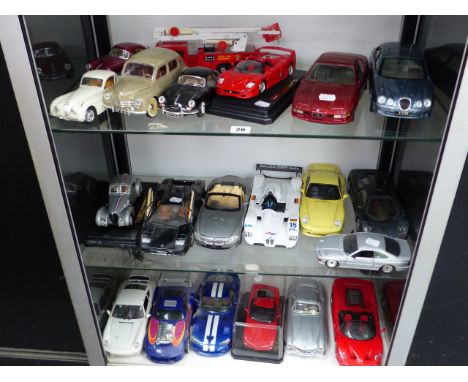 A QUANTITY OF BRUAGO AND MAISTO MODEL CARS ETC. 