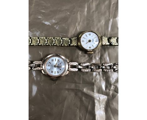 A 9ct GOLD AVIA LADIES WRIST WATCH ON A 9ct GOLD BRACELET STRAP WITH LADDER CLASP, TOGETHER WITH A PLATED ELCO LADIES WATCH. 