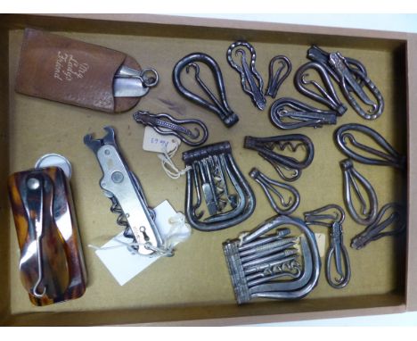 SEVENTEEN BUTTON HOOKS FOLDING INTO STEEL HOOP HANDLES, THREE BUTTON HOOK AND SHOEHORN COMBINATIONS, TWO BUTTON HOOK AND MULT