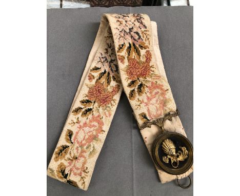 AN ANTIQUE EMBROIDERED BELL PULL, ONE SILVER AND VARIOUS COSTUME BROOCHES, NUT CRACKER ETC. 