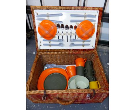 A VINTAGE PICNIC BASKET.