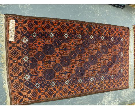 AN ANTIQUE BELOUCH RUG 178 x 101 cm
