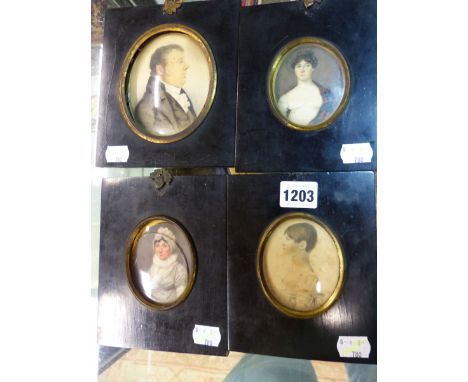 FOUR BLACK FRAMED PORTRAIT MINIATURES, ONE OF THE TWO PORTRAITS OF LADIES INSCRIBED ON THE BACK PERTH 1819, A PORTRAIT OF A C