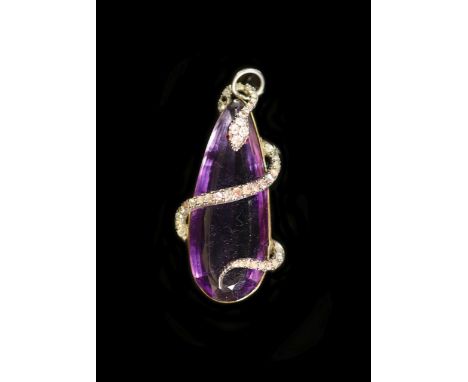   A Victorian gold mounted pear shaped amethyst pendant, entwined with diamond and ruby set serpent,44mm, gross weight 10.3 g