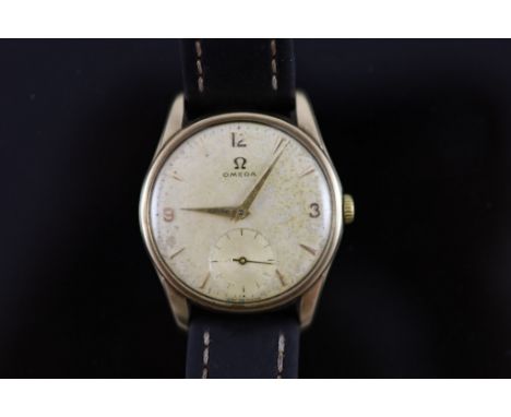   A gentleman's early 1960's 9ct gold Omega manual wind wrist watch,with quarterly Arabic numerals and subsidiary seconds, mo