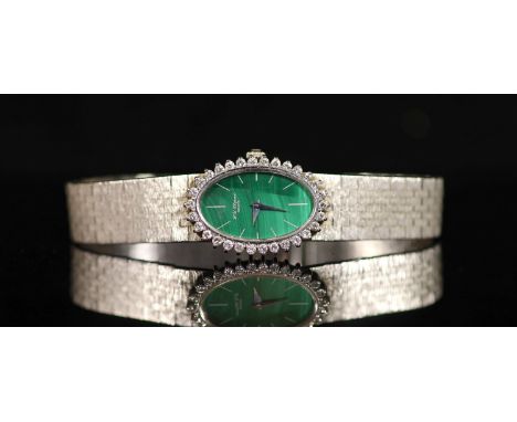   with oval malachite dial and diamond set bezel, overall 17cm, gross weight 38.6 grams, with Chopard box.Provenance - Mrs W 