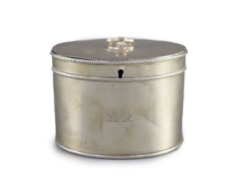   A George III silver oval tea caddy by John Younge &amp; Co,with engraved crest, ring handle and beaded borders, Sheffield, 