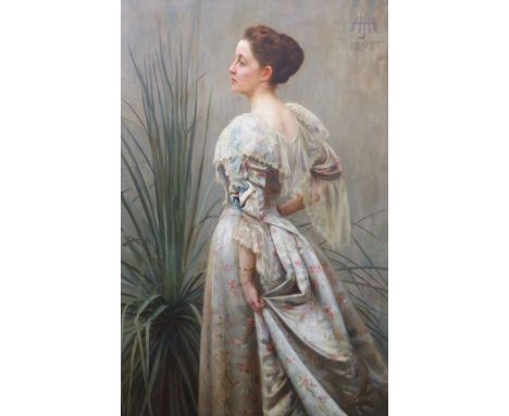   Henry John Hudson (1881-1912)Portrait of a lady standing in an elegant ballgown, beside a palm,Oil on canvasMonogrammed and