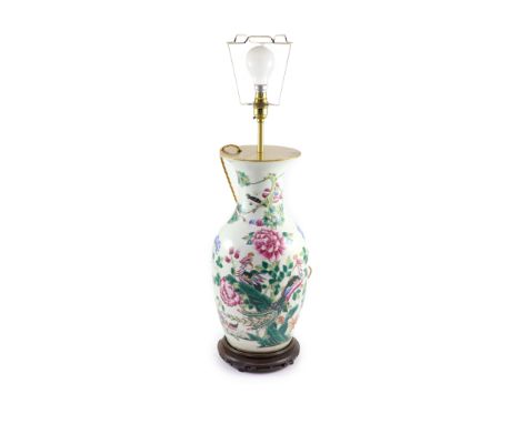   A large Chinese famille rose ‘phoenix’ vase, 19th century,painted with phoenixes amid peonies,43.5cm excluding later glued 