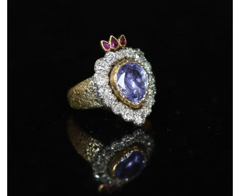   A 19th century gold, pear shaped sapphire, ruby and old cut diamond set flaming heart ring,with closed back setting and car