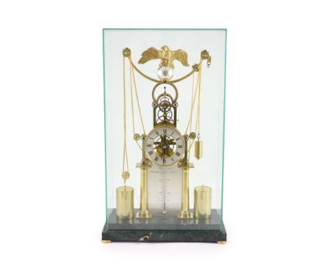   An F.H.Whitlock Empire style brass skeleton clockwith eagle surmount, silvered Roman chapter ring and silvered thermometer,
