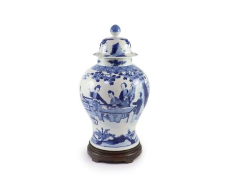   A large Chinese blue and white ‘ladies’ vase, Kangxi mark, 19th century,painted with ladies playing music and weiqi in a ga