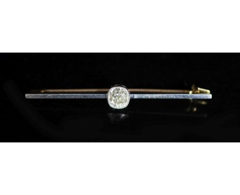   An early 20th century gold, platinum and solitaire diamond set bar brooch,the old round stone weighing approximately 1.50ct