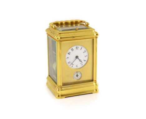   An early 20th century French quarter repeating Grand Sonnerie carriage alarum clockwith gorge case and Arabic numerals on e