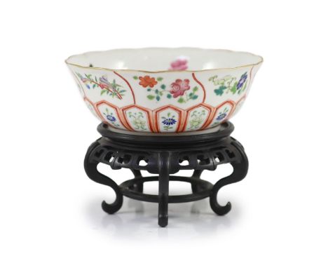   A Chinese famille rose bowl, Daoguang seal mark and of the period (1821-50),of petal lobed form, the exterior painted to sh