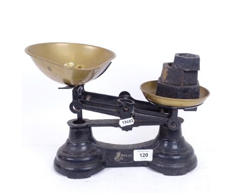 A set of Vintage cast-iron brass pan balance scales, with brass and iron weights 