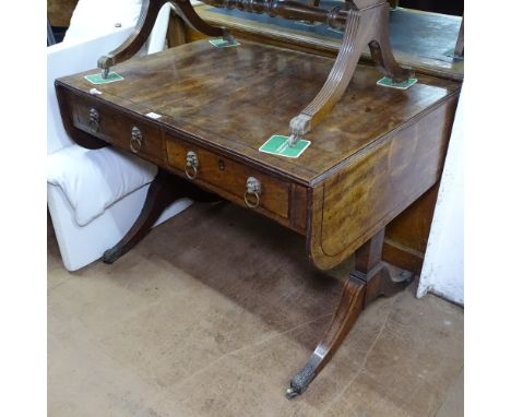 A Regency mahogany sofa table, with 2 frieze drawers having lion mask ring handles, on splayed legs, W92cm, H70cm 