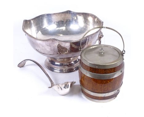 A large silver plate on copper 2-handled punch bowl, with lion mask ring handles, width 32cm, ladle, and an Edwardian oak and