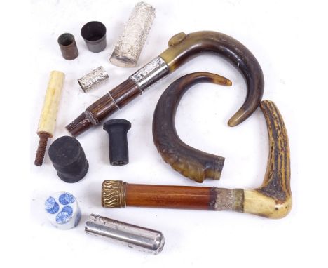 Various walking stick and cane tops, including early 20th century silver example, staghorn, and Chinese blue and white cerami
