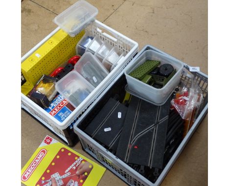 Box of Meccano and Scalextric track 