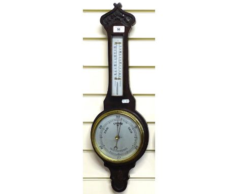 An oak-cased aneroid barometer and thermometer, height 65cm 