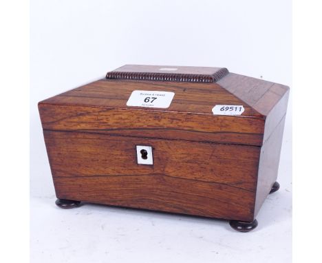 A Regency rosewood satinwood and mother-of-pearl inlaid tea caddy, on bun feet, length 20.5cm 
