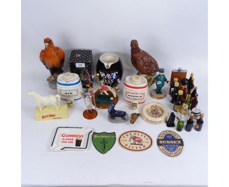 Breweriana, including Beswick golden eagle decanter, Royal Doulton bird of prey decanter, Wade VAT 69 bar jug, 2 Guinness ash