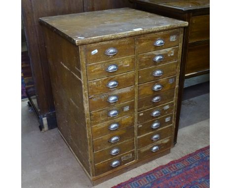 A small Vintage pine bank of 18 short drawers, W53cm, H74cm, D51cm 