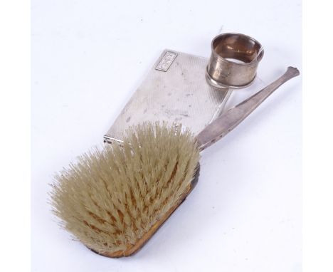 A rectangular engraved silver cigarette case, a silver thimble, and an engine turned silver-back dressing table brush 