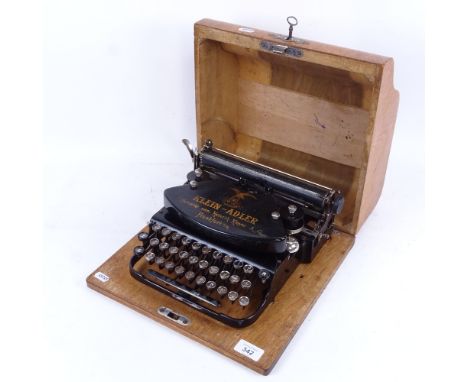 An early German portable typewriter by Klein-Adler, Frankfurt, in original oak case 