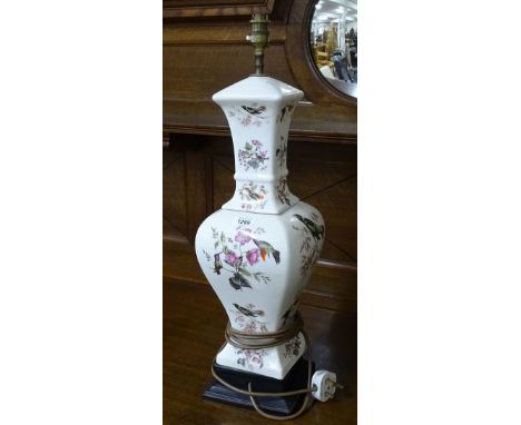 A white glazed ceramic table lamp with bird decoration, height to top of bayonet 63cm 