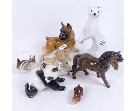 A group of mainly Russian and German ceramic animals, including a Russian white glaze stoat, height 18cm (7) 