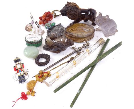 Various interesting collectables, including carved tigers eye lion, an 18th century Bilston enamel motto patch box, jadeite c
