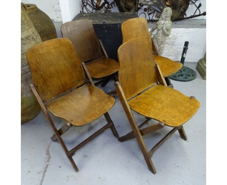 A set of 4 Vintage American ply-seated folding chairs, stamped US, American Seating Company Grand Rapids 