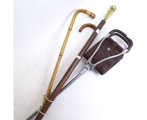 A shooting stick, 2 Vintage walking sticks, and a brass-topped staff, length 123cm (4) 