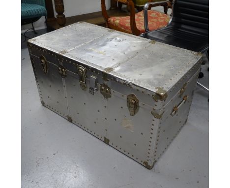 A large silvered coloured and studded trunk, L100cm, H54cm, D53cm 