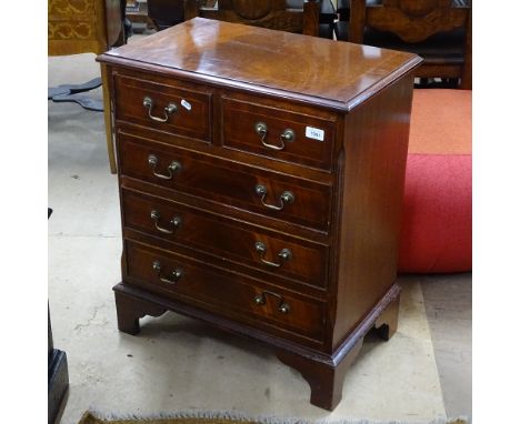 A reproduction mahogany chest of 2 short and 3 long drawers, on bracket feet, W60cm, H72cm, D36cm 
