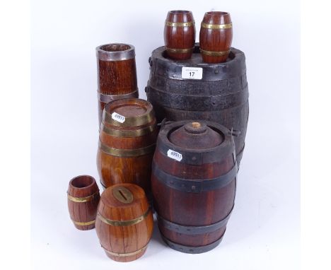 A group of coopered oak barrels, and a similar tapered small stick stand, height 31cm 