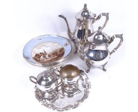 A ceramic cake plate with silver swing handle, and a 4-piece Queen's pattern silver plated tea and coffee set 
