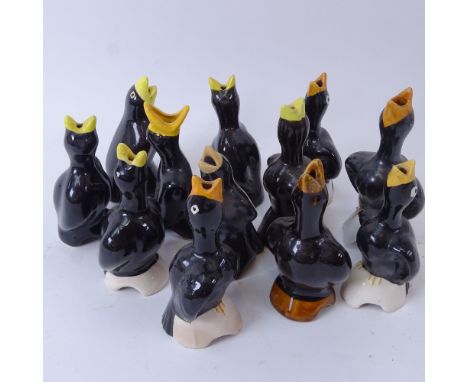 A collection of Vintage ceramic magpie bird pie funnels 
